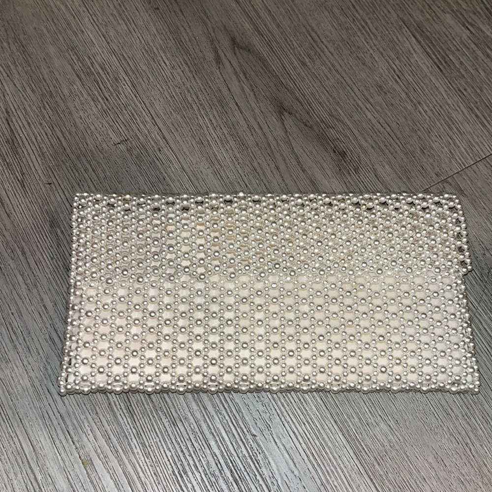 Pretty pearl clutch.